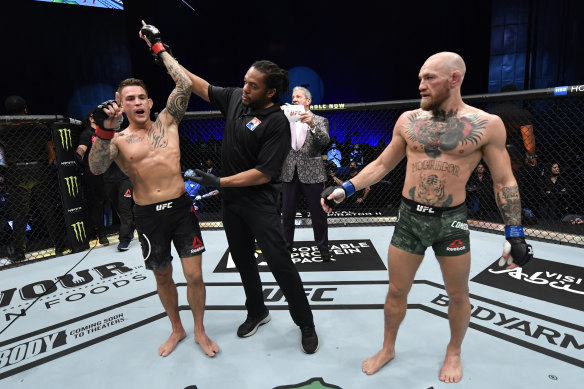 Dustin Poirier celebrates his victory over Conor McGregor.