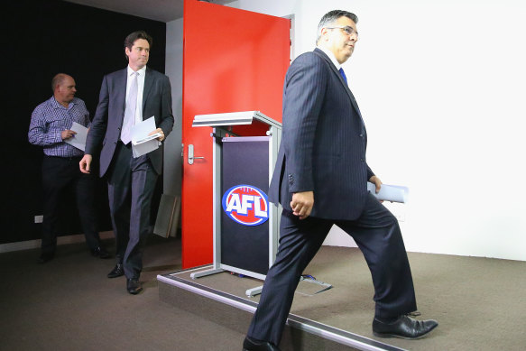 The then AFL CEO Andrew Demetriou and Gillon McLachlan in 2014. Demetriou says McLachlan should now be thinking about his own successor.