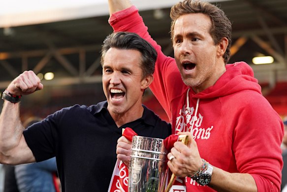 Rob McElhenney and Ryan Reynolds celebrate Wrexham’s latest promotion.