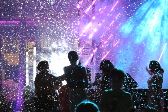 Revellers enjoying the snow machine at the launch of Sono Lumo, the light show presented by The Star at Queen’s Wharf.