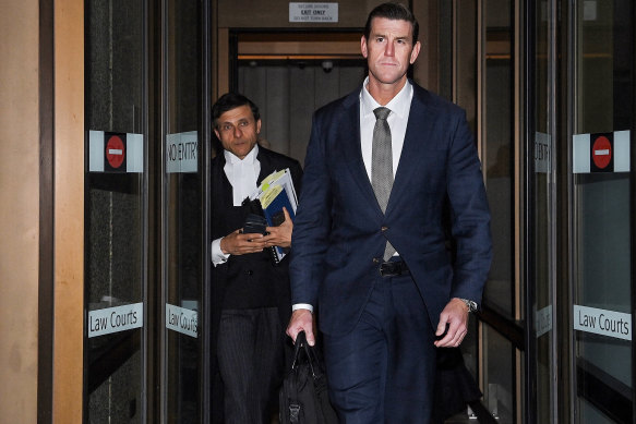 Ben Roberts-Smith leaving the Federal Court in Sydney with barrister Arthur Moses SC in June 2021.
