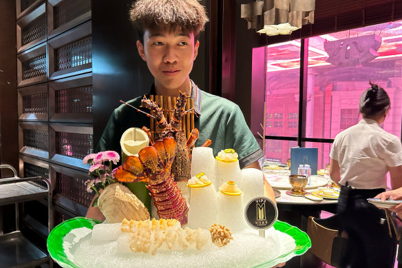 A big dish of sashimi made of Australian rock lobster and other seafood ready to be served at the Minmonfeast Restaurant in Beijing.