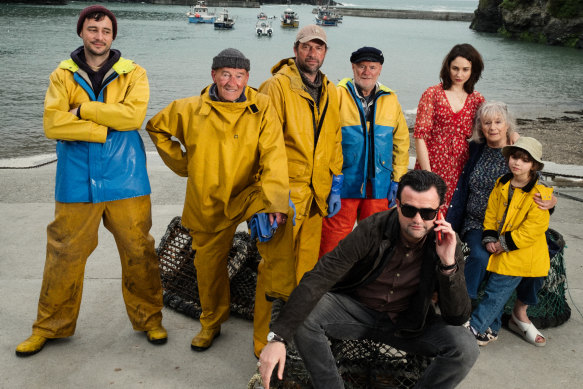 Daniel Mays (front) stars as Danny, the music label manager who "discovers" a group of Cornwall sea-shanty singers and turns them into pop stars in the based-on-fact comedy Fisherman's Friends.