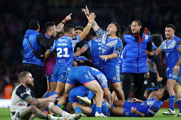 Josh Papalii and Samoa celebrate victory over England to reach the final of the World Cup in 2022.