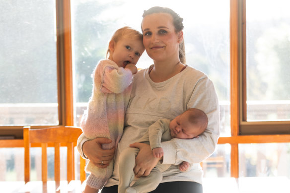 Cherubin with daughters Cora and Freya. She asked her midwives if she could stay in hospital for longer.