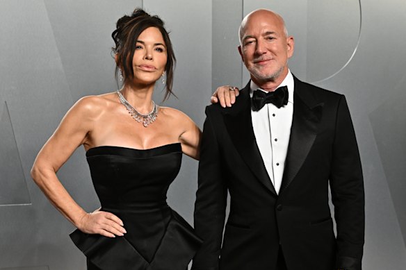 Lauren Sanchez Bezos and Jeff Bezos appear at the Vanity Fair Oscar Party in March.