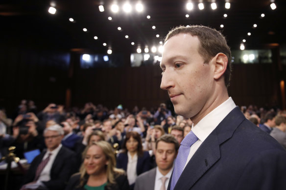 Facebook CEO Mark Zuckerberg arrives to testify before a joint hearing of Congress.