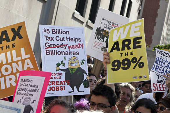 David Graeber, an anarchist anthropologist, examined how so many people were stuck in jobs they disliked when society produced enough to create extraordinary wealth of the kind that triggered the Occupy Wall Street protests (pictured).
