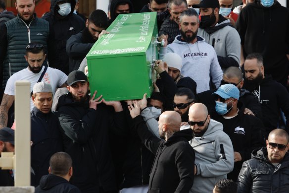 Mourners carried the coffin out of the mosque following the religious ceremony before it was taken to Rookwood Cemetery for burial. 