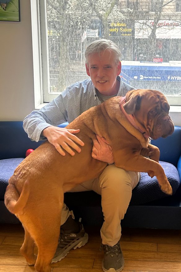Dean Vogel with his French mastiff, Daphne.