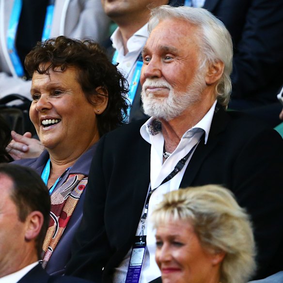 With close friend, singer Kenny Rogers, in 2015 at the Australian Open.