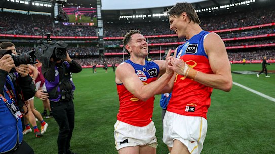Lachie Neale and Eric Hipwood celebrate.