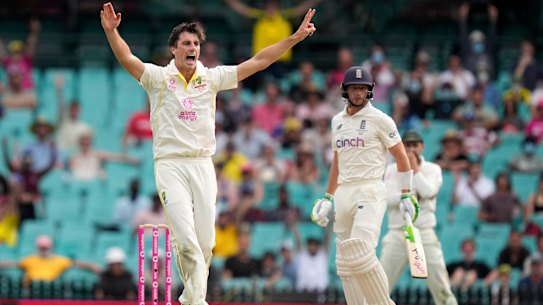 Cummins claims the wicket of Jos Buttler. 