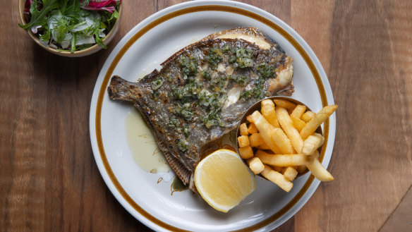 Whole John dory cooked over the parilla grill.