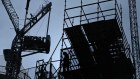 Balancing the risks? Large contractors want more up-front payment from clients to stop acting as unofficial banks for projects. 