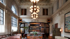 The Swan Room bar’s magnificent ceiling has been restored too. The upper velvet-draped windows overlook the area where tellers once served the bank’s clients.  