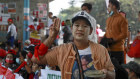 An anti-coup protester flashes a three-fingered salute of resistance in Yangon, Myanmar on Thursday.