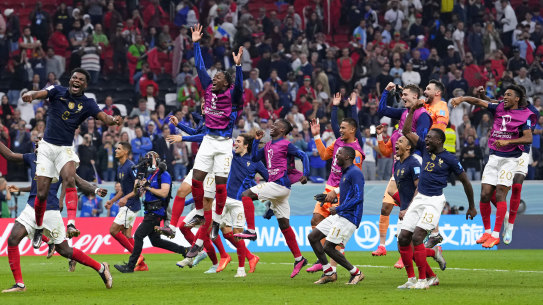 French players celebrate their semi-final win.