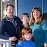 Ruth Giles at her three-bedroom apartment with her husband Rob and children Nova and Peter.