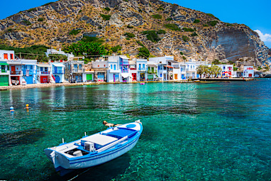 Scenic Klima village (traditional Greek village by the sea, the Cycladic-style) with sirmata - traditional fishermen’s houses, Milos island, Cyclades, Greece.