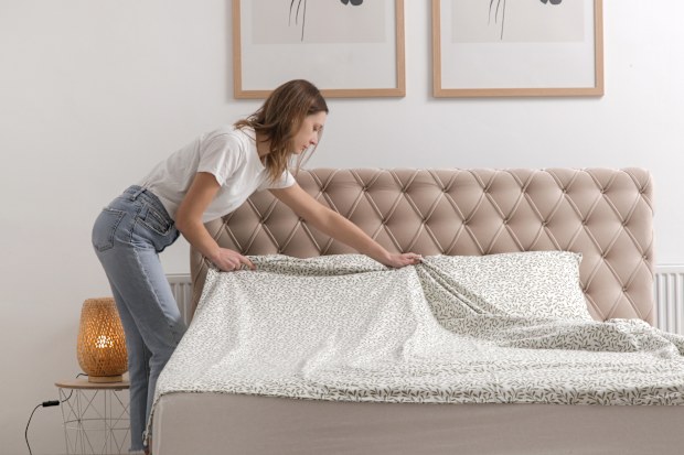 Woman making the bed