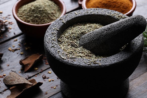 Use a mortar and pestle to bash and break open any old whole spices.
