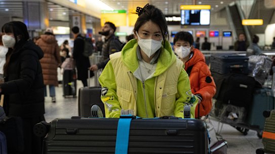 Passengers arrive at Heathrow airport on a flight from Shanghai on December 29, 2022 in London.