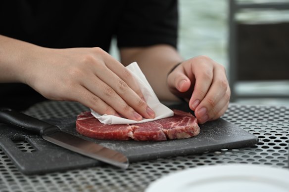 Pat meat dry before cooking.