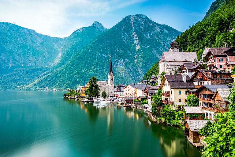 Austria’s lakeside village of Hallstatt is popular with tourists so choose the time and manner of your own visit carefully.