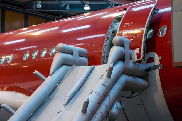 As well as getting in the way of other passengers, suitcases can also wreck emergency slides too.