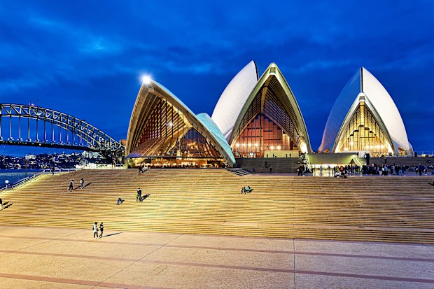 Sydney Opera House and Harbour Bridge at dusk, Australia.