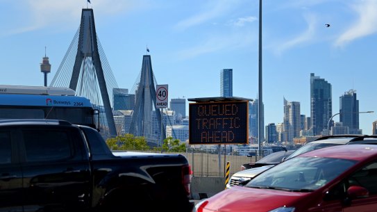 Traffic on Victoria Road near Robert Street in Rozelle.
