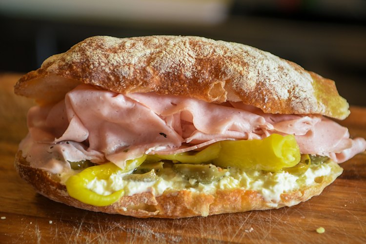 The Bologna with mortadella, stracciatella, pickled peppers and olives.