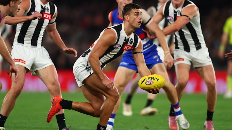 AFL LIVE: Prime-time Pies storm back late to set up a thrilling finish against the Dogs; Lions’ flag defence on the brink