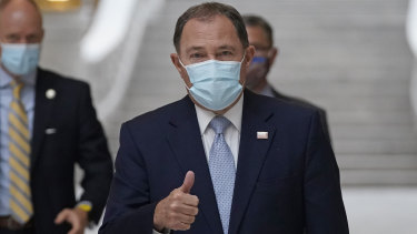 Governor Gary Herbert gives a thumbs up as he walks to a COVID-19 briefing Monday (US time).