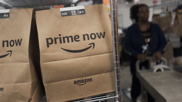 Amazon is prioritising customers and hiring 100,000 staff to try and keep up with demand.