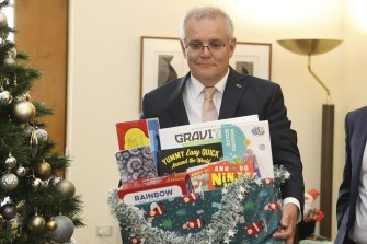 Prime Minister Scott Morrison and his box of toys.