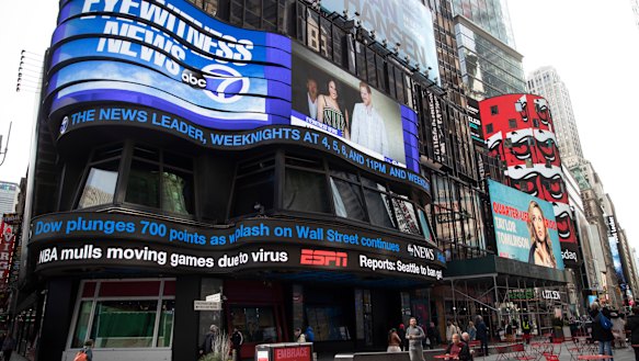 The ABC News ticker displays market updates and the possibility of the NBA moving games due to the coronavirus on March 11. The season was later suspended.