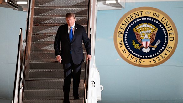 Trump arrived on Air Force One at about 9pm, local time.