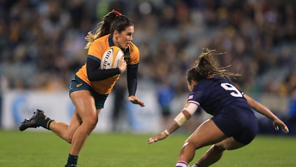 Charlotte Caslick of the Wallaroos runs the ball during the Pacific Four Series International Match between Australia Wallaroos and USA.