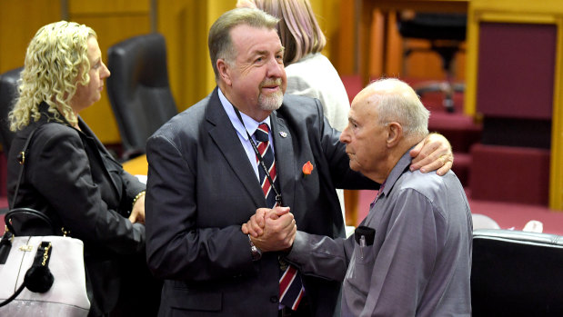 Cr Paul Tully (left) is seen following the Ipswich City Council's final meeting at the Ipswich City Council Chambers.