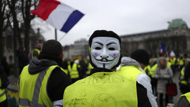 Yellow vest protesters march during a demonstration in Lille, northern France, on Saturday.