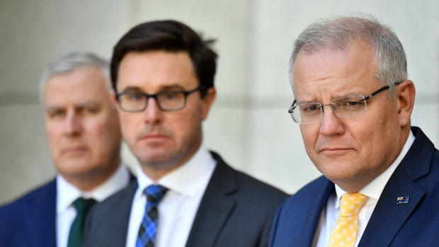 Prime Minister Scott Morrison, with Deputy Prime Minister Michael McCormack (left) and Minister for Water Resources David Littleproud (middle), said he was "stepping up" his drought response.  