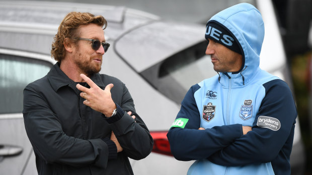 Famous praise: Andrew Johns, right with actor Simon Baker, is impressed with his young charge.