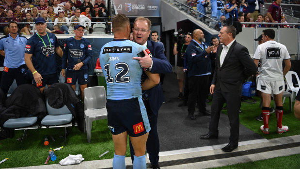 NSWRL boss Dave Trodden with Tariq Sims after game one of last year’s State of Origin series.