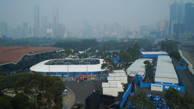Smoke clouds the Melbourne skyline and the site of the Australian Open last week.