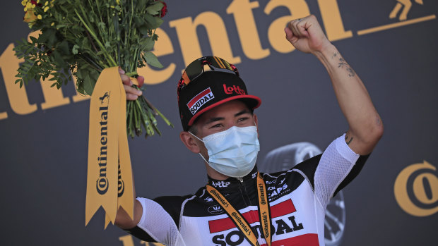 Ewan celebrates on the podium after claiming his second victory in this year's Tour de France.