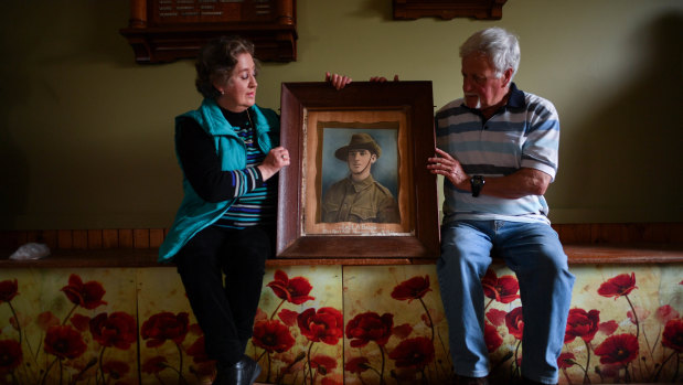 Graeme Baugh and Gillian Elijah with a picture of Edgar Arthur Baugh. 