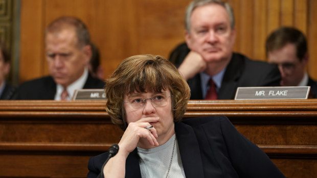 Phoenix prosecutor Rachel Mitchell listens to Christine Blasey Ford testify before the Senate Judiciary Committee.