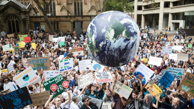 About 20,000 students skipped school on Friday to call for action on climate change at Sydney Town Hall.